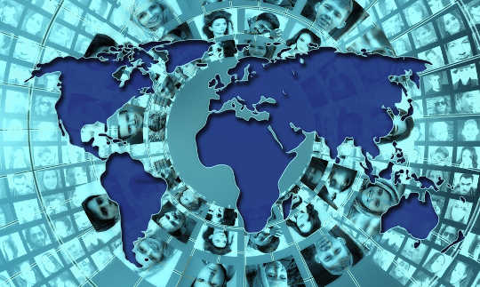 How to Protect the People You Love from Cybercrime map of the planet with faces in the background